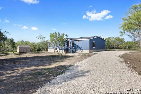 10.01 Acres of Land with Home for Sale in Jourdanton, Texas