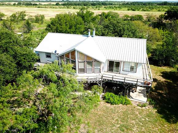 100 Acres of Land with Home for Sale in Lohn, Texas