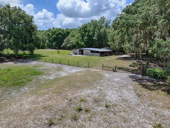 7.37 Acres of Land with Home for Sale in Sumterville, Florida