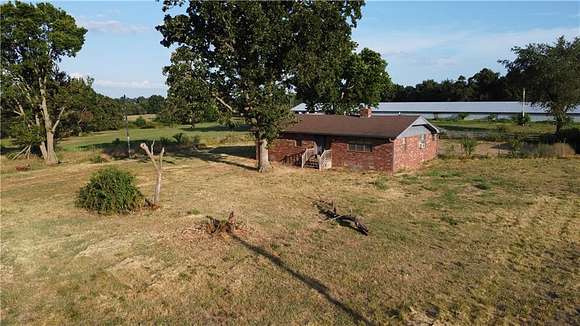 20 Acres of Agricultural Land with Home for Sale in Southwest City, Missouri