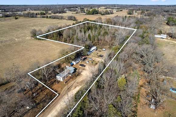 6.17 Acres of Residential Land with Home for Sale in Mount Pleasant, Texas