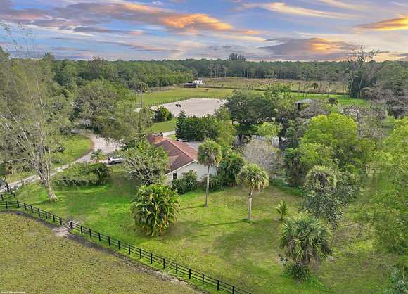 10.963 Acres of Land with Home for Sale in Loxahatchee Groves, Florida