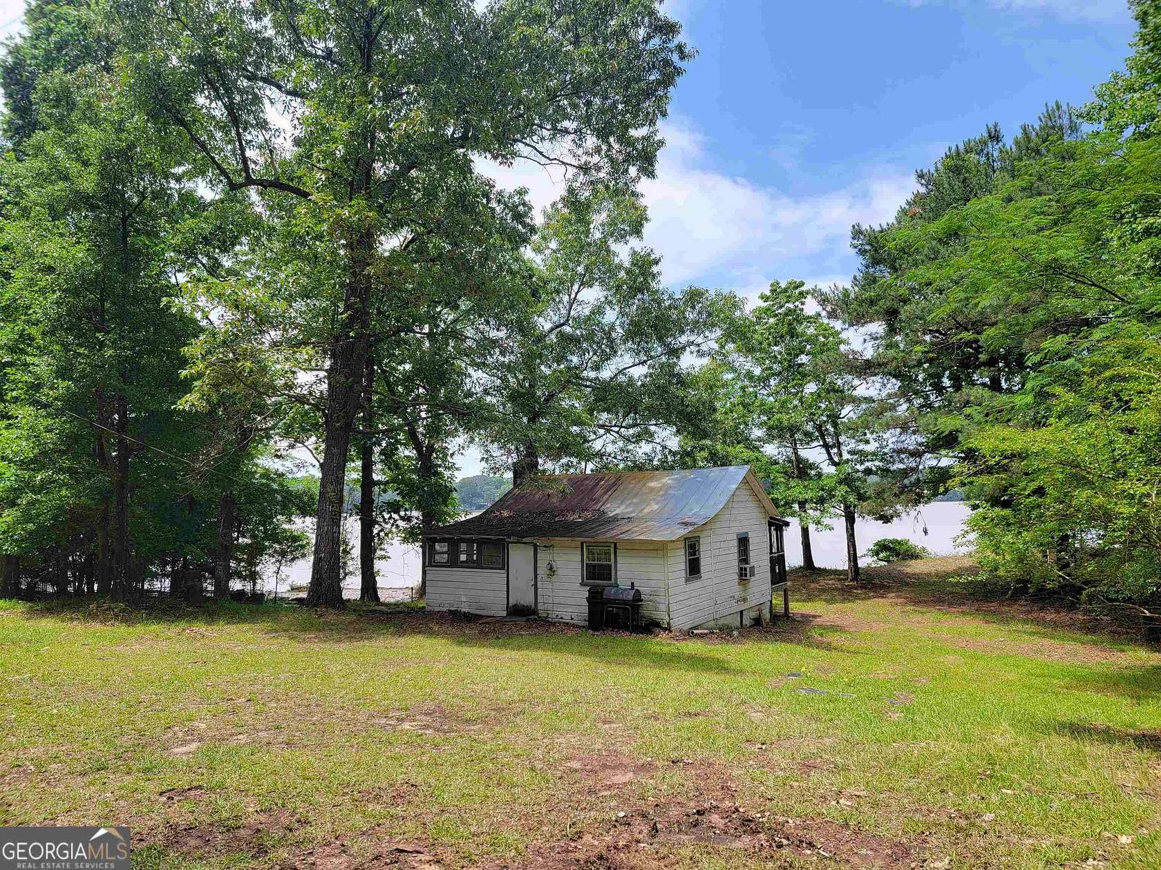 11.91 Acres of Land with Home for Sale in Covington, Georgia