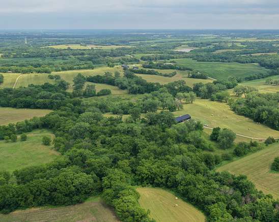 77.78 Acres of Land with Home for Sale in Maysville, Missouri