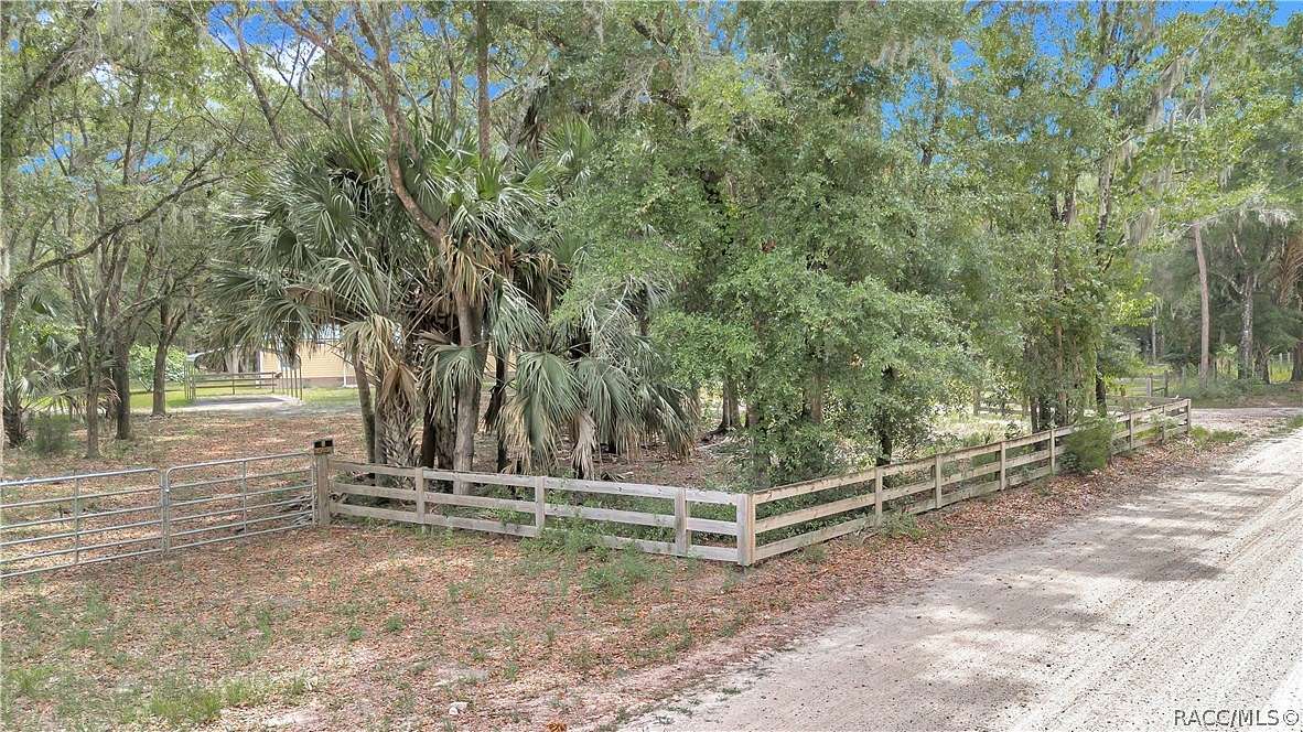 56.55 Acres of Recreational Land with Home for Sale in Inglis, Florida