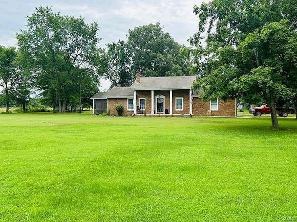 14.5 Acres of Land with Home for Sale in Puxico, Missouri