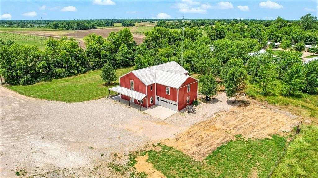 5 Acres of Residential Land with Home for Sale in Paris, Texas