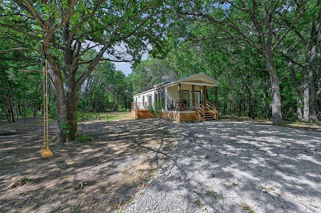 9.3 Acres of Residential Land with Home for Sale in Sadler, Texas