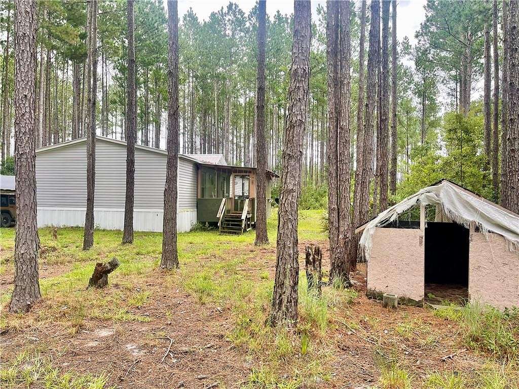 40 Acres of Land with Home for Sale in Waycross, Georgia