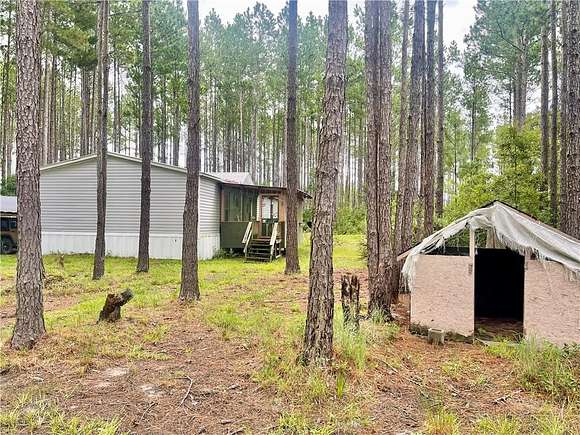 40 Acres of Land with Home for Sale in Waycross, Georgia