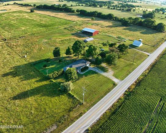 79 Acres of Agricultural Land with Home for Sale in Pierce City, Missouri