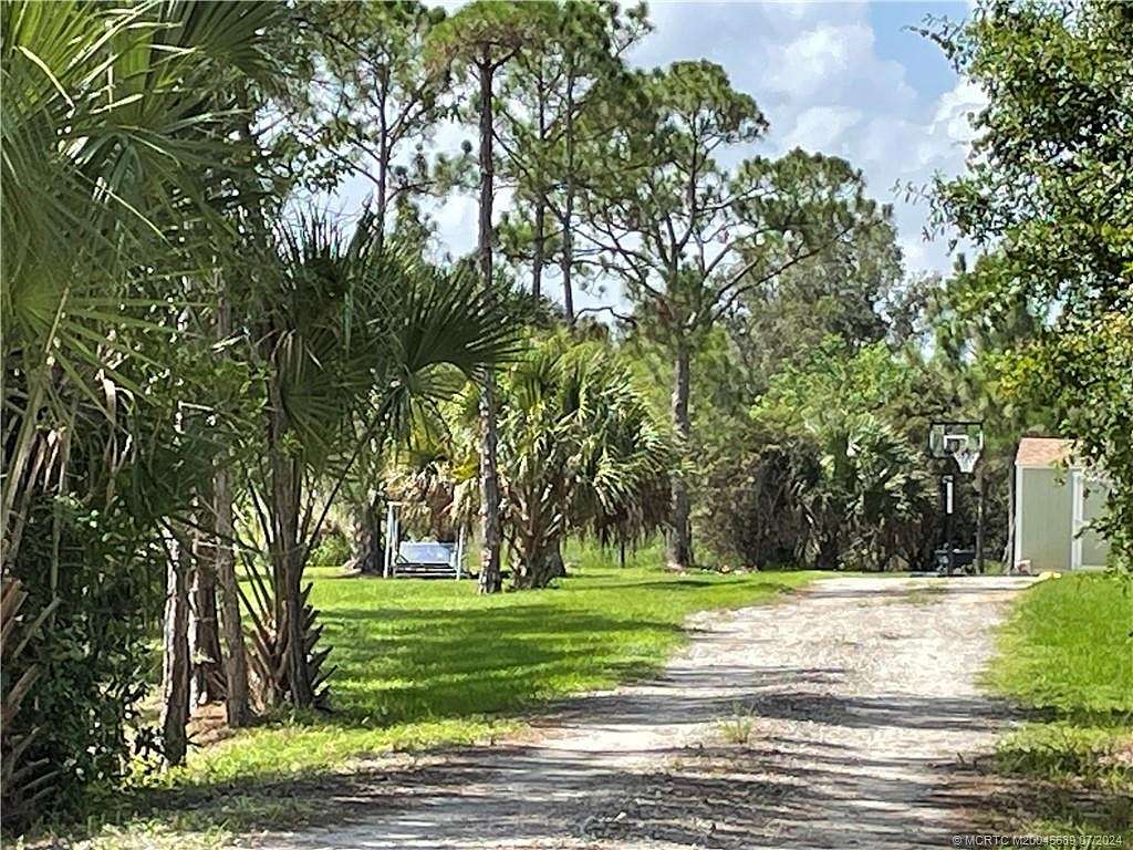 5 Acres of Residential Land with Home for Sale in Indiantown, Florida