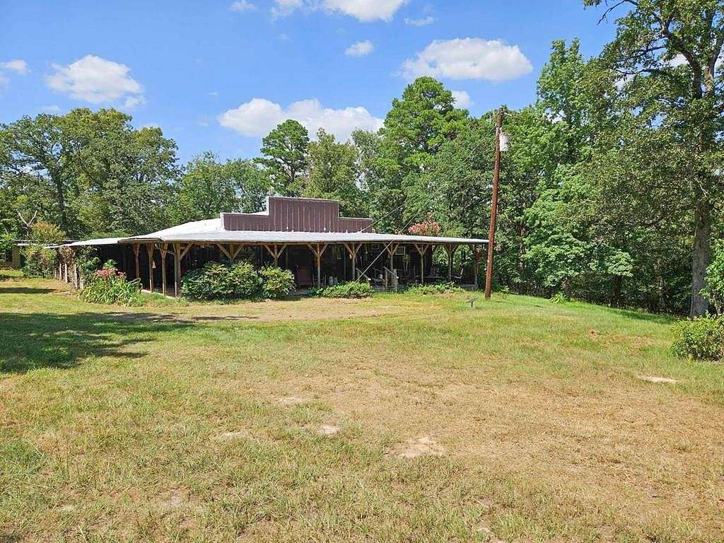 76.73 Acres of Land with Home for Sale in Palestine, Texas