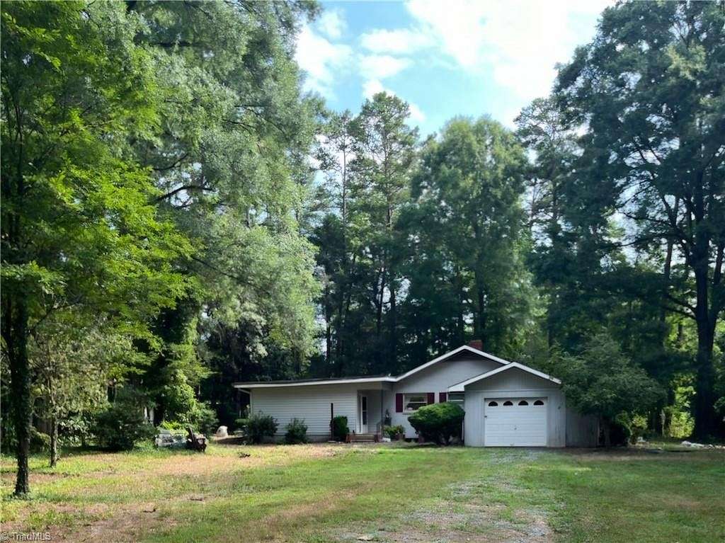 15.4 Acres of Land with Home for Sale in Walnut Cove, North Carolina