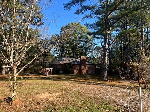 10 Acres of Residential Land with Home for Sale in Mooreville, Mississippi