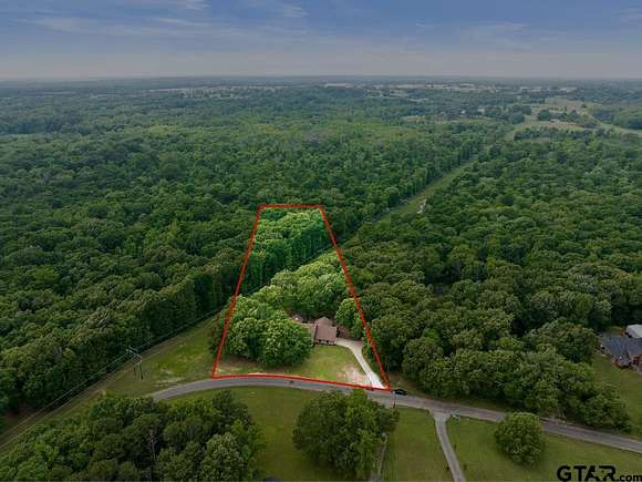 3.279 Acres of Residential Land with Home for Sale in Mount Pleasant, Texas