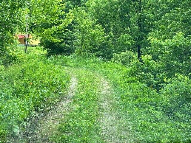 2.3 Acres of Residential Land with Home for Sale in Flat Lick, Kentucky