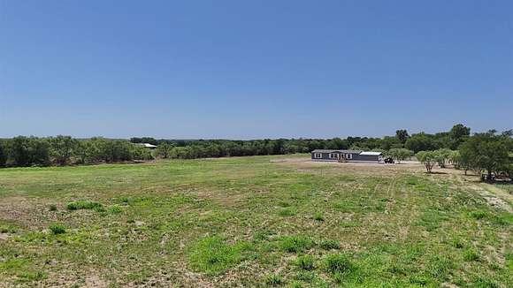 10.285 Acres of Land with Home for Sale in Mineral Wells, Texas