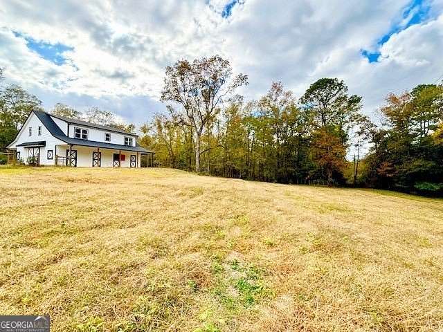 80.18 Acres of Agricultural Land with Home for Sale in Milner, Georgia