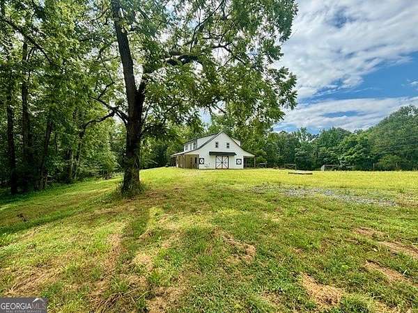 80.2 Acres of Agricultural Land with Home for Sale in Milner, Georgia