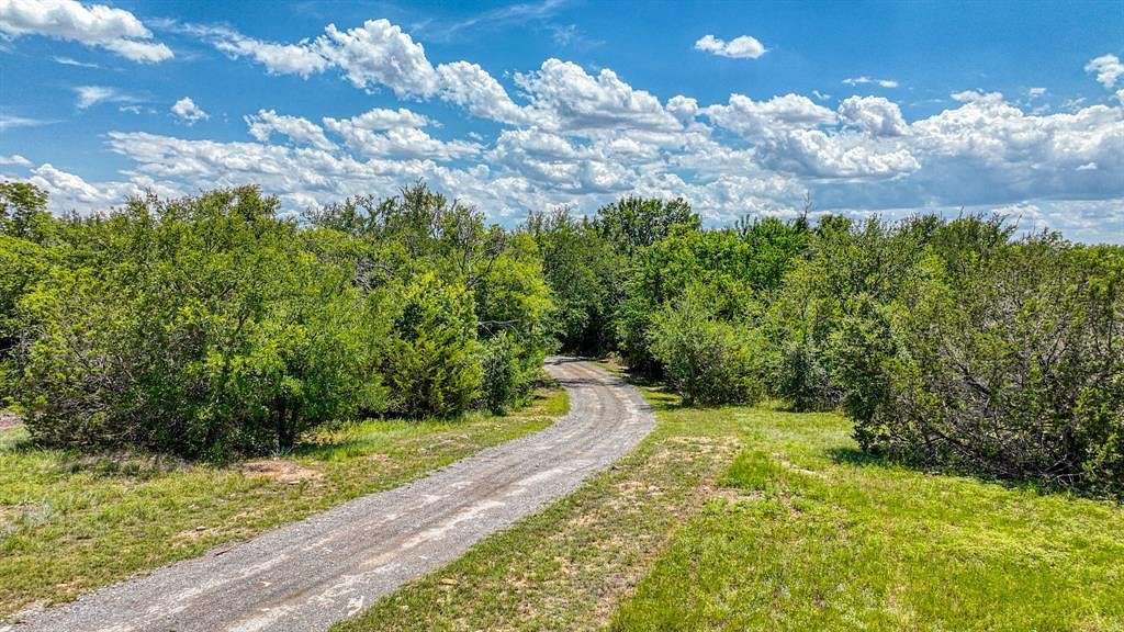 12.09 Acres of Land with Home for Sale in Springtown, Texas