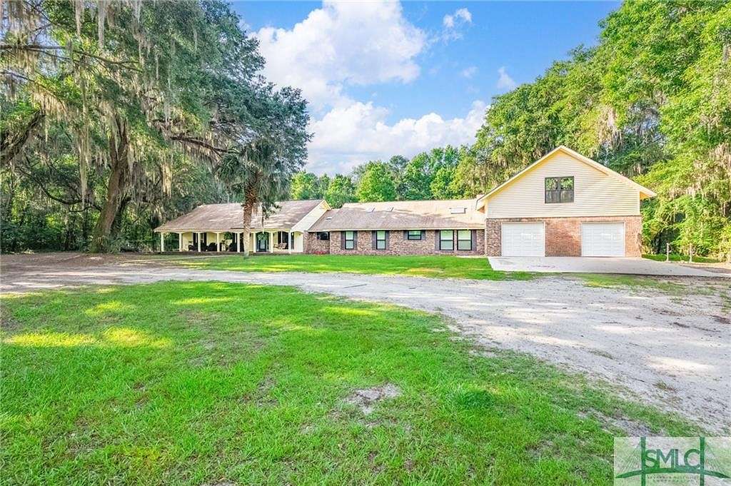 5.53 Acres of Residential Land with Home for Sale in Richmond Hill, Georgia