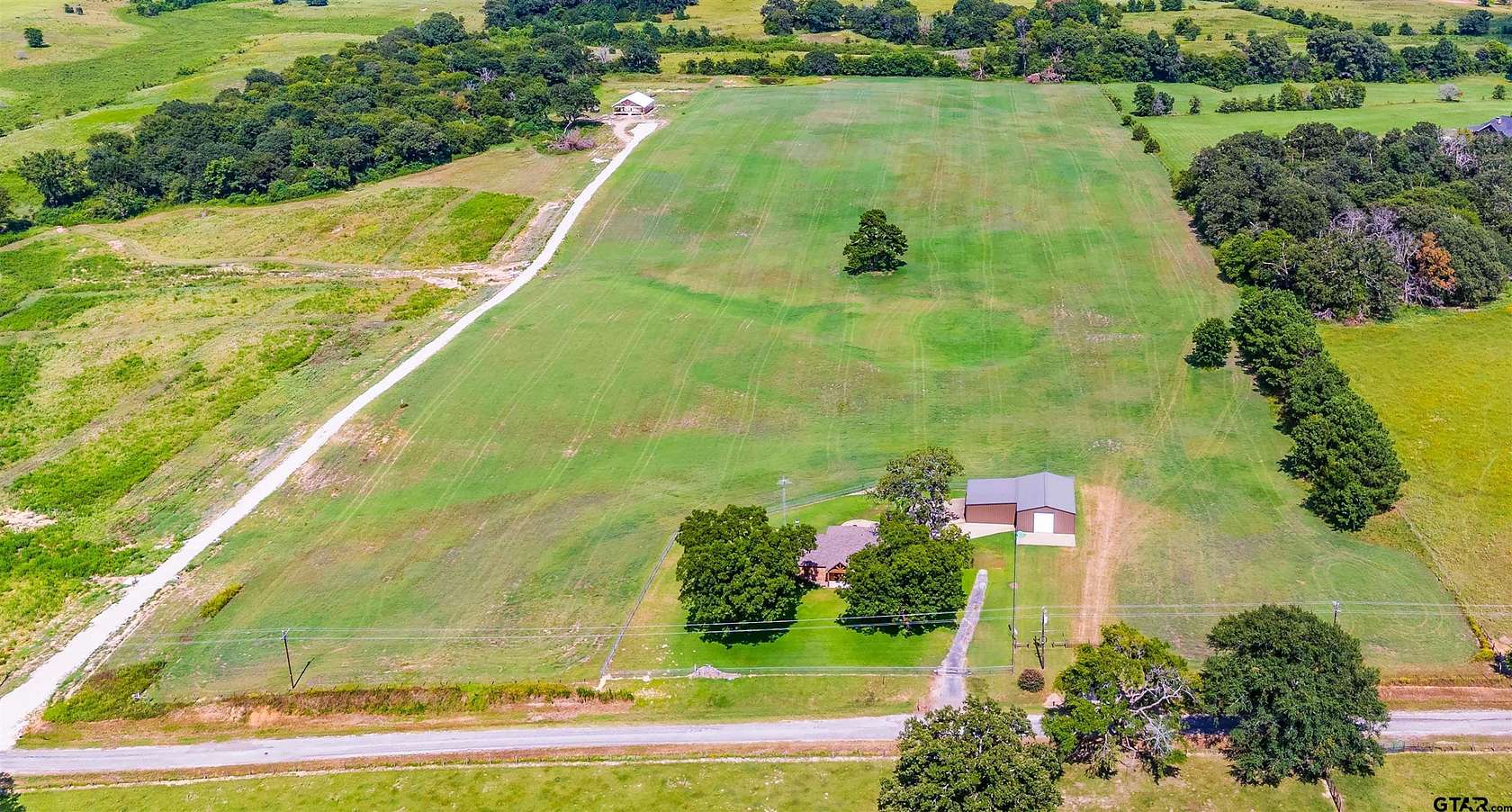 24.26 Acres of Land with Home for Sale in Troup, Texas