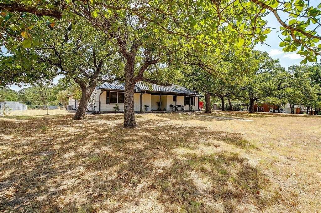 2.4 Acres of Residential Land with Home for Sale in Springtown, Texas