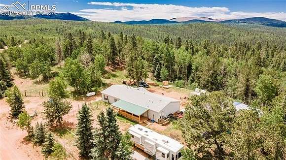 5.55 Acres of Residential Land with Home for Sale in Cripple Creek, Colorado