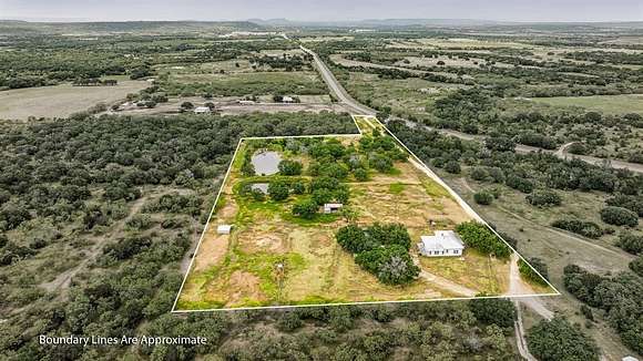 9.32 Acres of Land with Home for Sale in Mingus, Texas