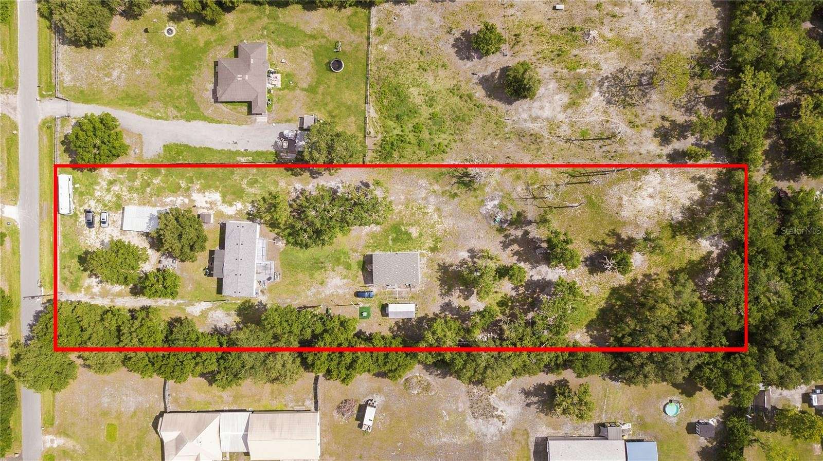 2.38 Acres of Residential Land with Home for Sale in St. Cloud, Florida