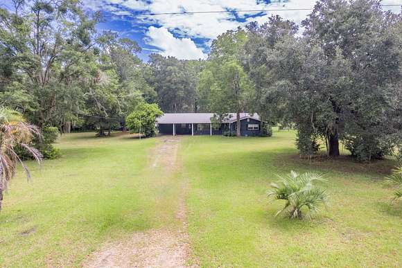 4.7 Acres of Residential Land with Home for Sale in Brooker, Florida