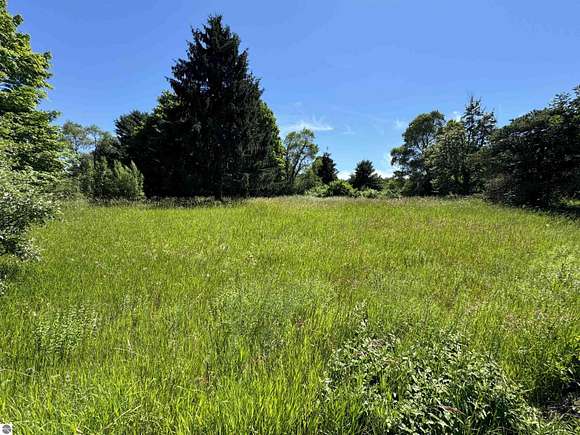 0.97 Acres of Land for Sale in Cedar, Michigan