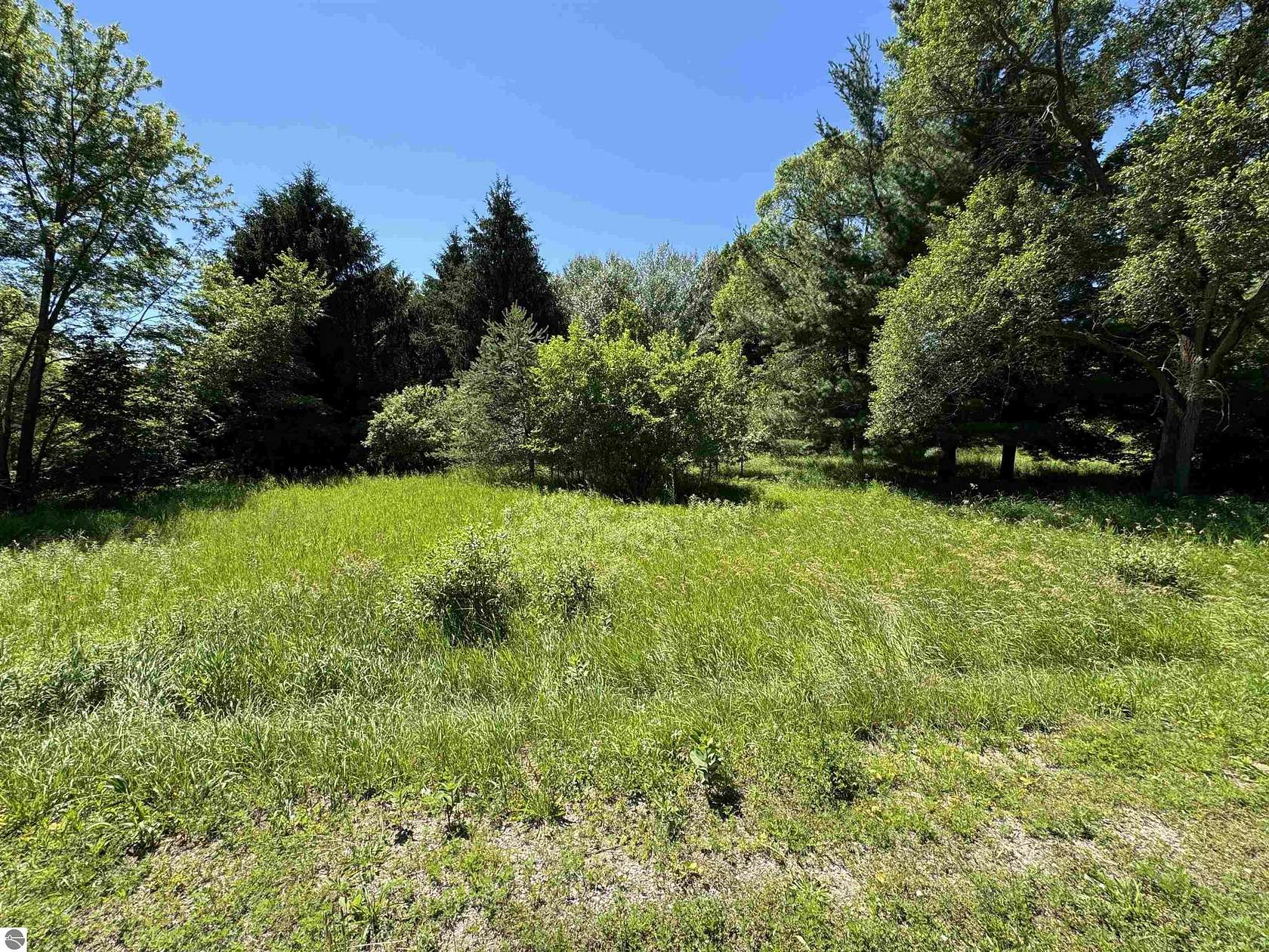 0.59 Acres of Land for Sale in Cedar, Michigan