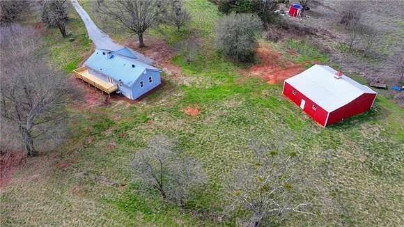 25.04 Acres of Land with Home for Sale in Maysville, Georgia