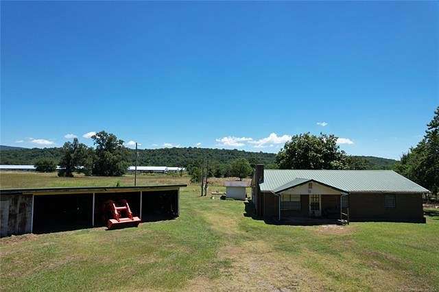 78.64 Acres of Agricultural Land with Home for Sale in Shady Point, Oklahoma