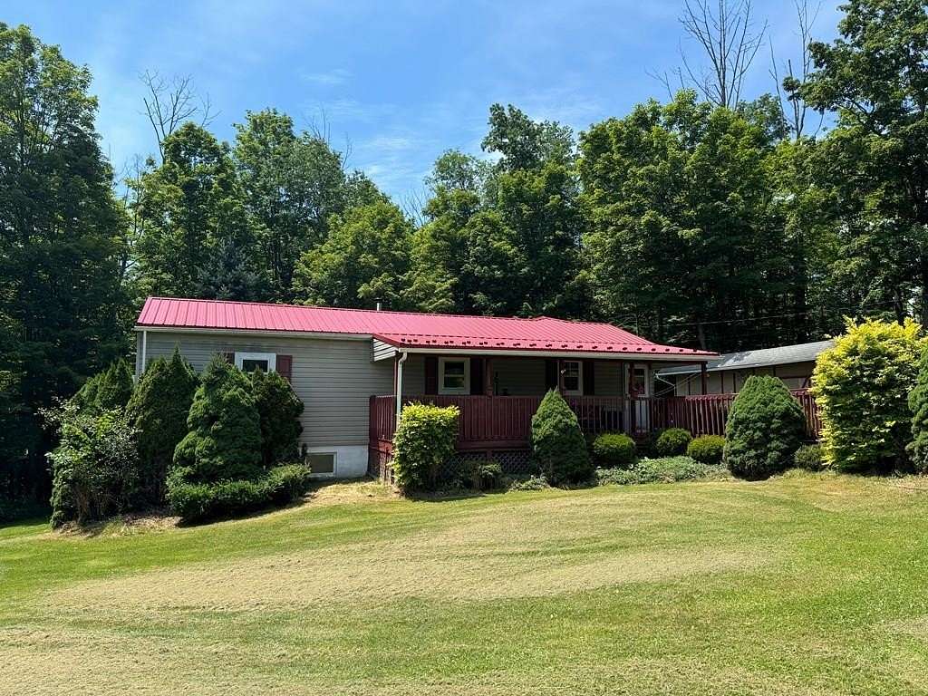 21 Acres of Recreational Land with Home for Sale in Columbia Cross Roads, Pennsylvania