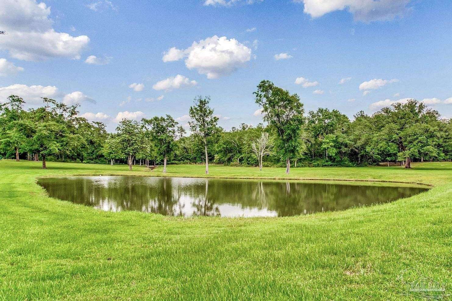 26 Acres of Agricultural Land with Home for Sale in Milton, Florida