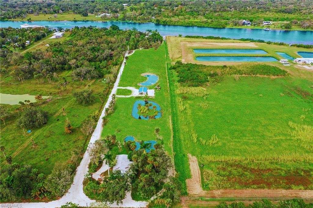 5.65 Acres of Residential Land with Home for Sale in Alva, Florida