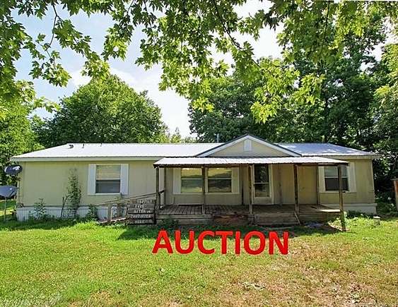 5.443 Acres of Land with Home for Auction in Watts, Oklahoma