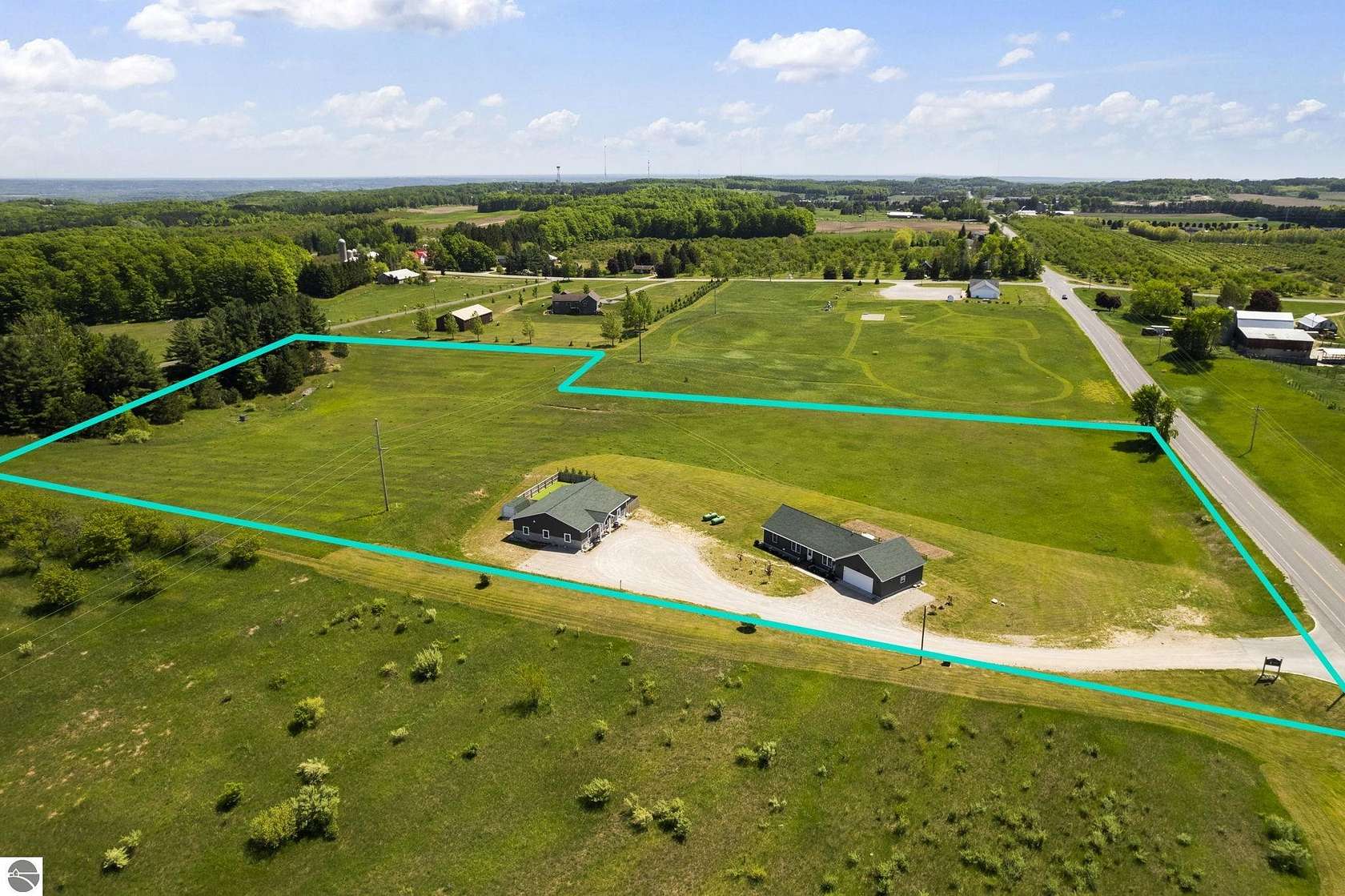 11 Acres of Improved Mixed-Use Land for Sale in Cedar, Michigan