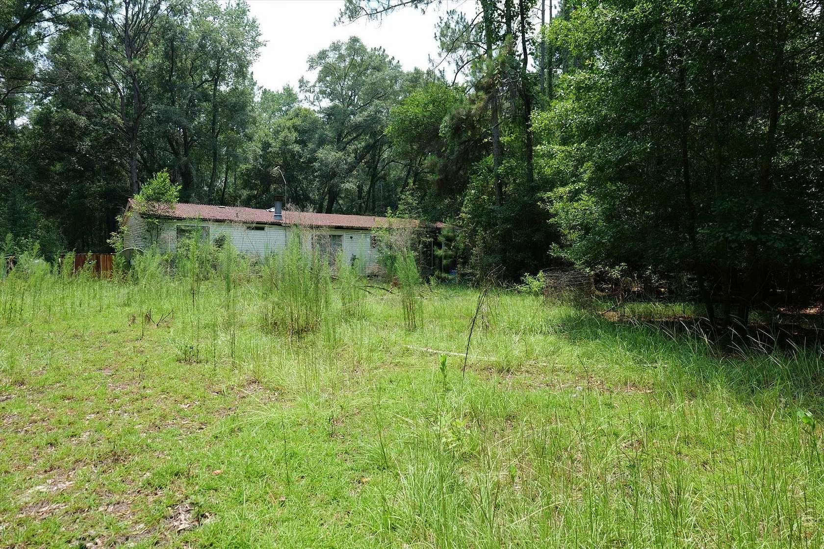 5.3 Acres of Residential Land with Home for Sale in Tallahassee, Florida