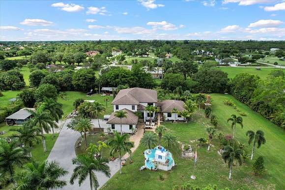 2.5 Acres of Residential Land with Home for Sale in Palm Beach Gardens, Florida
