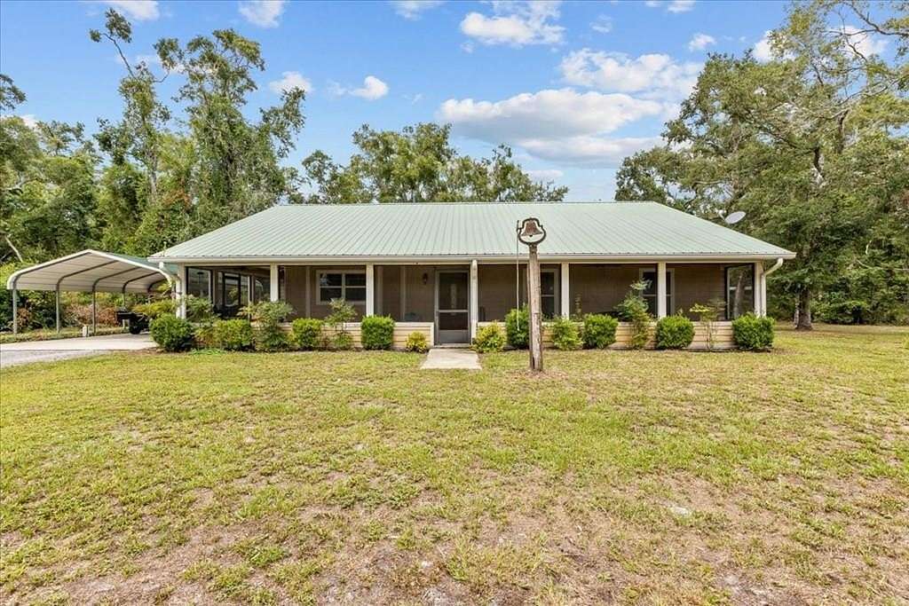 8.87 Acres of Land with Home for Sale in Old Town, Florida