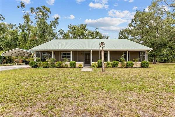 8.87 Acres of Land with Home for Sale in Old Town, Florida