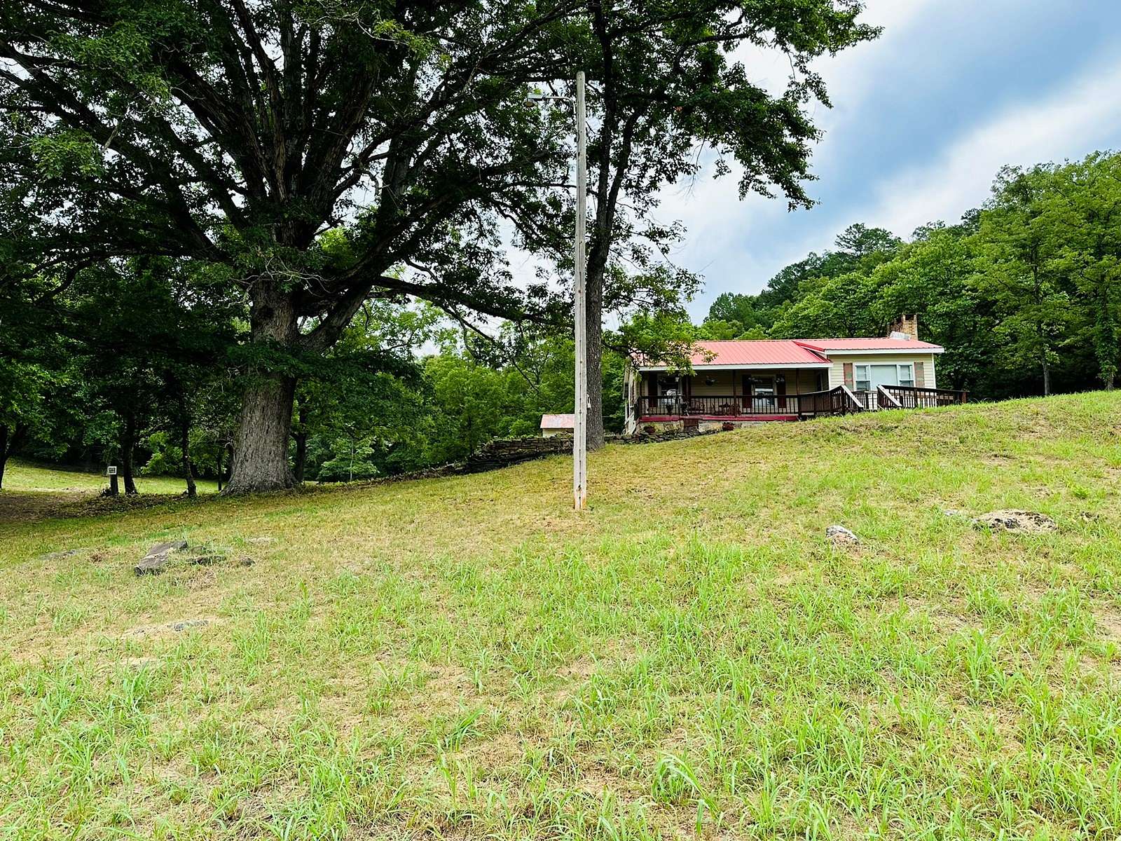 9.1 Acres of Residential Land with Home for Sale in Calico Rock, Arkansas