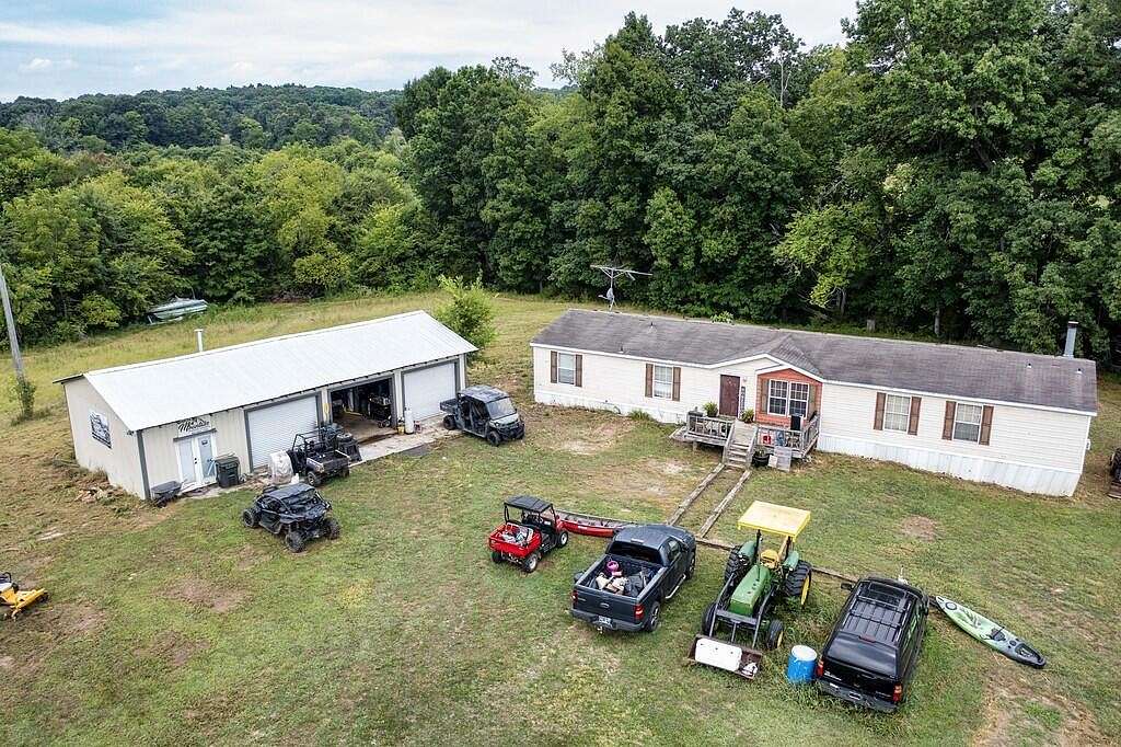 34 Acres of Agricultural Land with Home for Sale in Riceville, Tennessee