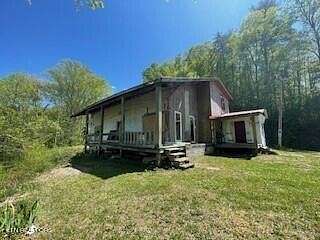 6.2 Acres of Residential Land with Home for Sale in Helenwood, Tennessee