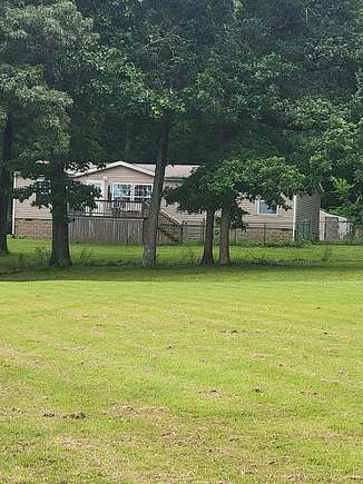 4.5 Acres of Residential Land with Home for Sale in Paris, Tennessee
