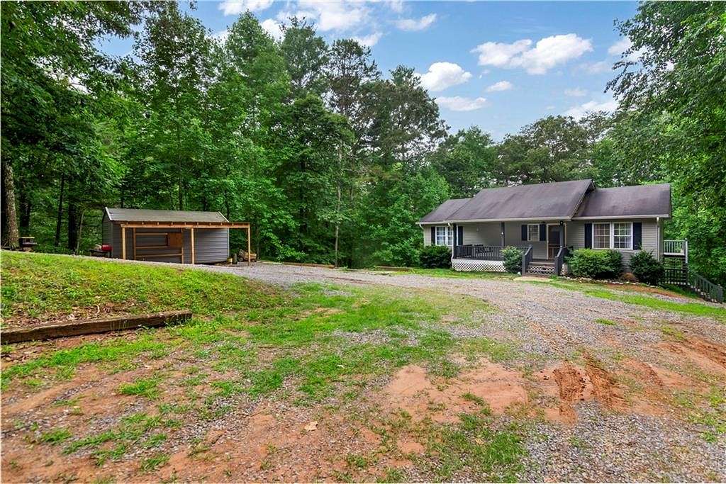 5 Acres of Residential Land with Home for Sale in Ellijay, Georgia